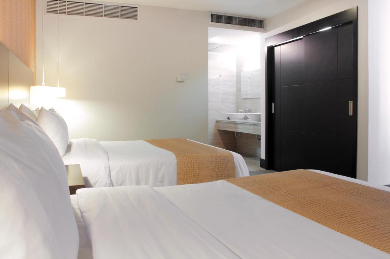 Hotel Trinitarias Suites Barquisimeto Bagian luar foto